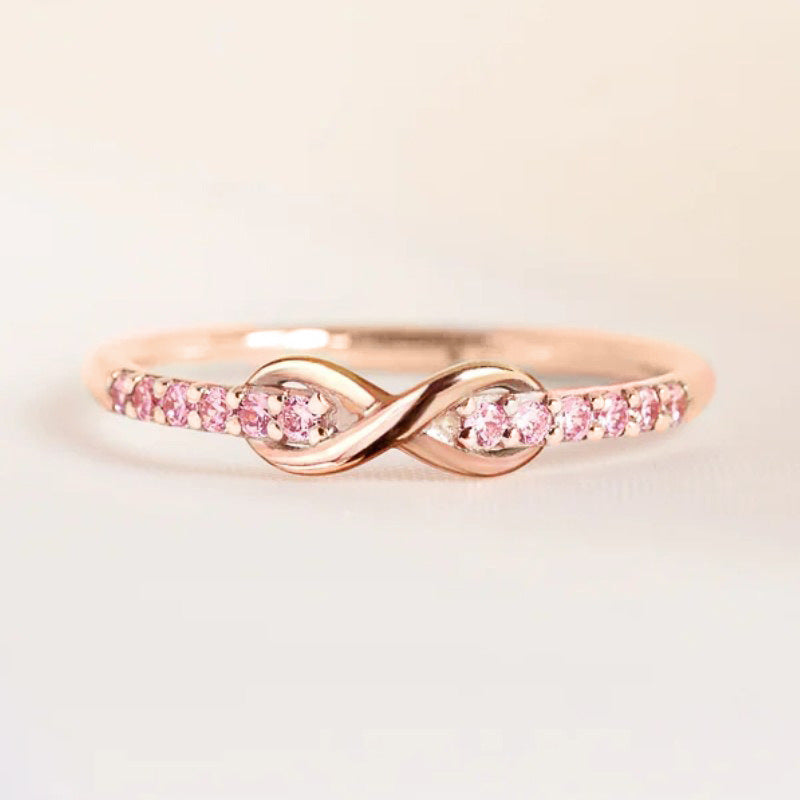 18k gold pink diamond wrapped infinity ring