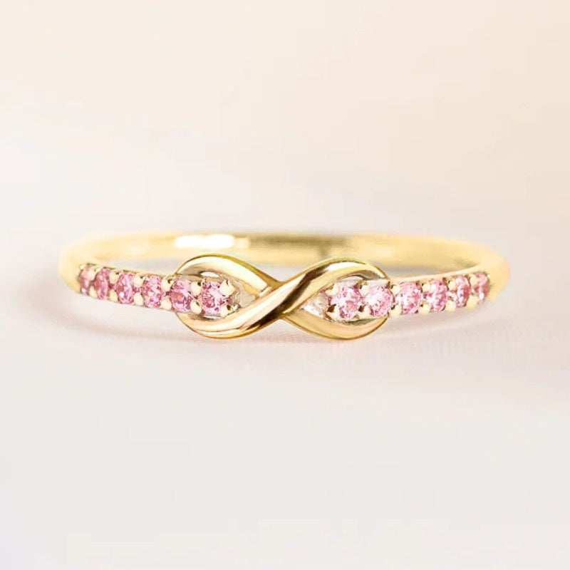 18k gold pink diamond wrapped infinity ring