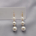 18k Pearl Earrings With Three Pearls